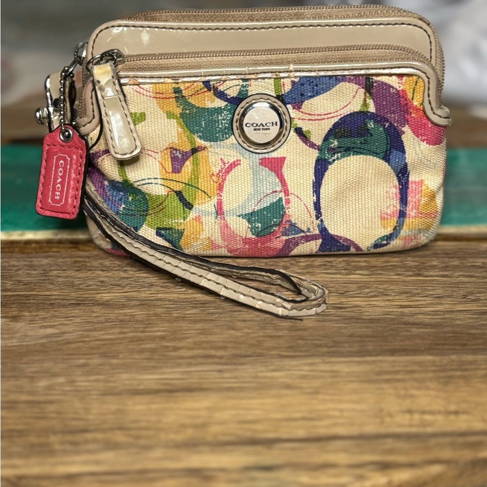 Coach Poppy Beige and Multicolor Wristlet with Hangtag.